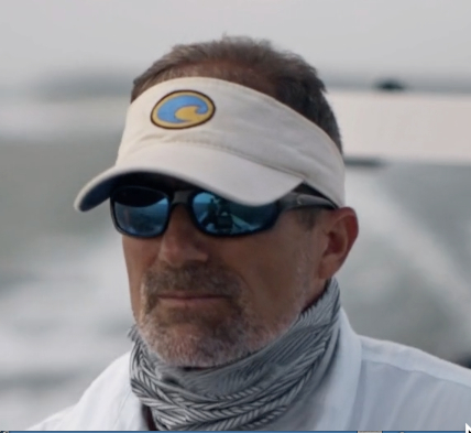 Capt Barry Hoffman looking for fish in key largo